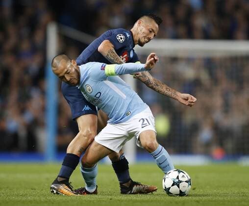 David Silva of Manchester City tussles with Marek Hamsik of Napoli during the champions league match at the Etihad Stadium, Manchester. Picture date 17th October 2017. Picture credit should read: Simon Bellis Sportimage EDITORIAL USE ONLY. No use with unauthorised audio, video, data, fixture lists, club league logos or live services. Online in-match use limited to 120 images, no video emulation. No use in betting, games or single club league player publications.