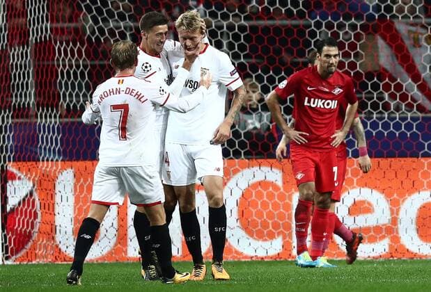 MOSCOW, RUSSIA - OCTOBER 17, 2017: FC Sevilla s Michael Krohn-Dehli, Sergio Escudero and Simon Kjaer (L-R) celebrate scoring in the 2017 18 UEFA Champions League Group E Round 3 football match against Spartak Moscow at Otkrytiye Arena Stadium. Stanislav Krasilnikov TASS  TS0650C5