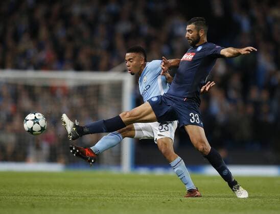 Gabriel Jesus of Manchester City tackles by Raul Albiol of Napoli during the champions league match at the Etihad Stadium, Manchester. Picture date 17th October 2017. Picture credit should read: Simon Bellis Sportimage EDITORIAL USE ONLY. No use with unauthorised audio, video, data, fixture lists, club league logos or live services. Online in-match use limited to 120 images, no video emulation. No use in betting, games or single club league player publications.