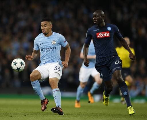 Gabriel Jesus of Manchester City and Kalidou Koulibaly of Napoli during the champions league match at the Etihad Stadium, Manchester. Picture date 17th October 2017. Picture credit should read: Simon Bellis Sportimage EDITORIAL USE ONLY. No use with unauthorised audio, video, data, fixture lists, club league logos or live services. Online in-match use limited to 120 images, no video emulation. No use in betting, games or single club league player publications.