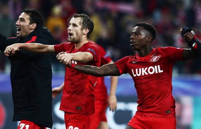 MOSCOW, RUSSIA - OCTOBER 17, 2017: Spartak Moscow s Ivelin Popov, Dmitry Kombarov and Quincy Promes (L-R) celebrate their club s victory in the 2017 18 UEFA Champions League Group E Round 3 football match against FC Sevilla at Otkrytiye Arena Stadium. FC Spartak Moscow won the game 5-1. Stanislav Krasilnikov TASS  TS0650E5
