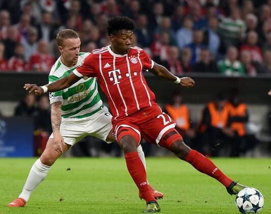 Leigh Griffiths (Celtic Glasgow), David Alaba (FC Bayern Muenchen). Deutschland, Muenchen: Fussball, UEFA Champions League, Matchday 3: FC Bayern Muenchen vs Celtic Glasgow am 18.10.2017, Allianz-Arena.