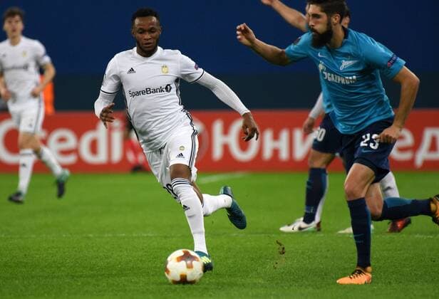 Russia. St. Petersburg. October 19, 2017. Rosenborg players Samuel Adegbenro and Zenit Mihai Mevlea (left to right) during the group stage match of the UEFA Europa League between Zenit (Russia, St. Petersburg) and Rosenborg (Norway, Trondheim).