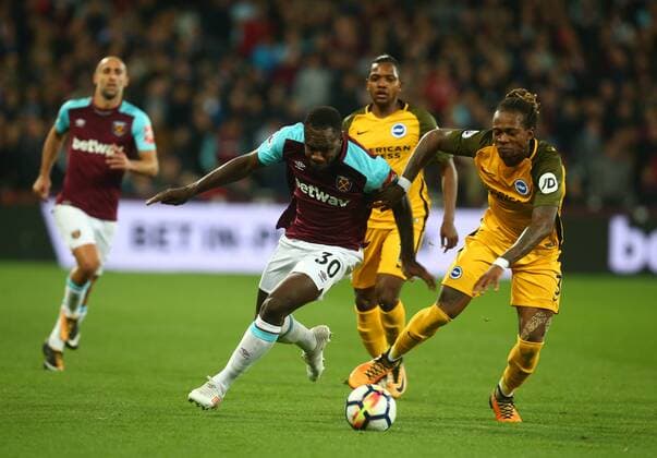 October 20, 2017 - London, England, United Kingdom - West Ham United s Michail Antonio takes on Brighton & Hove Albion s Gaetan Bong.during Premier League match between West Ham United against Brighton and Hove Albion at The London Stadium, Queen Elizabeth II Olympic Park, London, Britain - 20 Oct 2017 West Ham United v Brighton and Hove Albion - Premier League  - ZUMAn230 20171020_zaa_n230_328 Copyright: xKieranxGalvinx