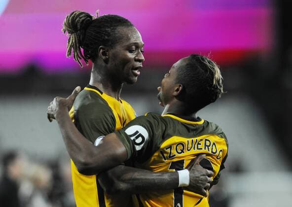 Football - 2017 2018 Premier League - West Ham United vs. Brighton & Hove Albion Delighted Brighton players, Gaetan Bong and Jose Izquierdo (right) after the match at The London Stadium. COLORSPORT ANDREW COWIE 