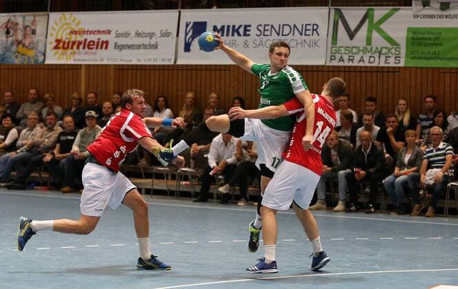 v.li.: Max Darj (Bergischer HC), Patrick Schmidt (DJK Rimpar Wölfe), Maciej Majdzinski (Bergischer HC), DKB 2. Handball-Bundesliga, DJK Rimpar Wölfe - Bergischer HC,