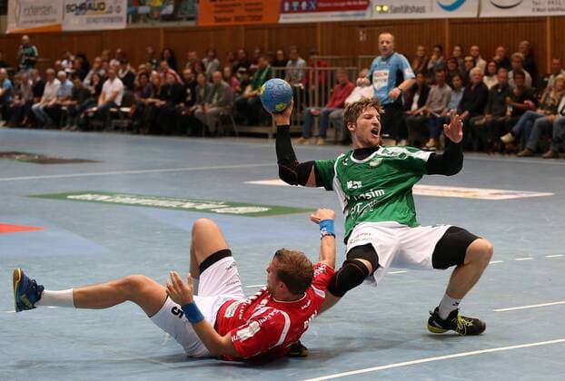 v.li.: Max Darj (Bergischer HC), Jan Schäffer (DJK Rimpar Wölfe), DKB 2. Handball-Bundesliga, DJK Rimpar Wölfe - Bergischer HC,