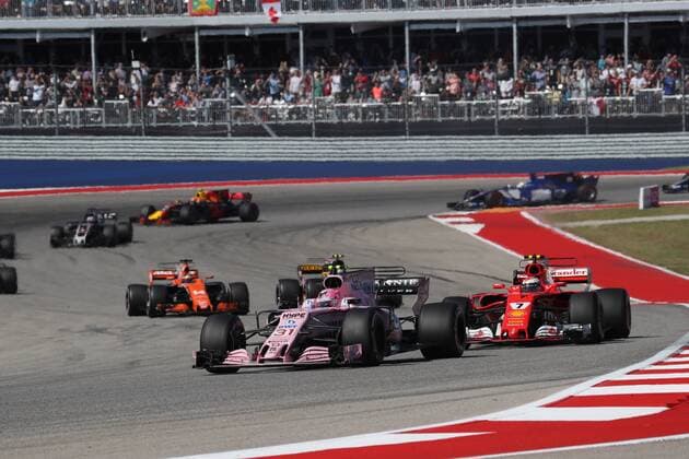 22.10.2017 - Race, Esteban Ocon (FRA) Sahara Force India F1 VJM10 and Kimi Raikkonen (FIN) Scuderia Ferrari SF70H United States Grand Prix, Austin 19 - 22 October 2017 22.10.2017 - Race, Esteban Ocon (FRA) Sahara Force India F1 VJM10 and Kimi Raikkonen (FIN) Scuderia Ferrari SF70H 