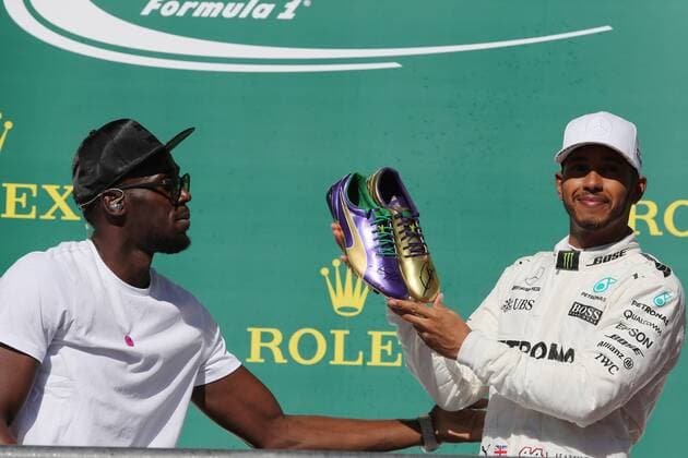 22.10.2017 - Race, Usain Bolt (JAM) and Lewis Hamilton (GBR) Mercedes AMG F1 W08 race winner United States Grand Prix, Austin 19 - 22 October 2017 22.10.2017 - Race, Usain Bolt (JAM) and Lewis Hamilton (GBR) Mercedes AMG F1 W08 race winner 