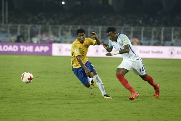 India: England and Brazil Semi Final match England Callum Hudson-Odoi (jersey 14) and Brazil Wesley (jersey 2) in action during the FIFA U 17 World Cup India 2017 Semi Final match in Kolkata. Players of England and Brazil in action during the FIFA U 17 World Cup India 2017 Semi Final match on October 25, 2017 in Kolkata. Kolkata West Bengal India Kolkata  SaikatxPaulx xPacificxPress