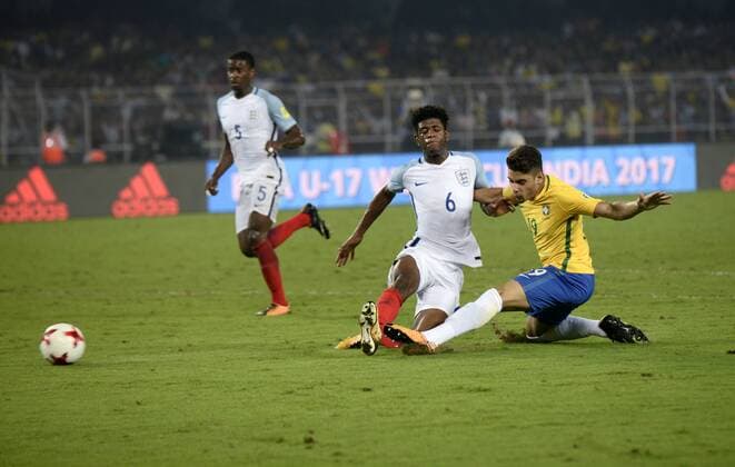 India: England and Brazil Semi Final match England Jonathan Panzo (jersey 6) and Brazil Yuri Alberto (jersey 19) in action during the FIFA U 17 World Cup India 2017 Semi Final match in Kolkata. Players of England and Brazil in action during the FIFA U 17 World Cup India 2017 Semi Final match on October 25, 2017 in Kolkata. Kolkata West Bengal India Kolkata  SaikatxPaulx xPacificxPress
