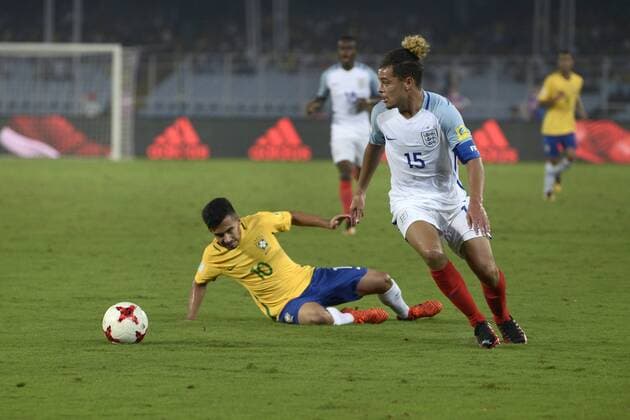 India: England and Brazil Semi Final match England Joel Latibeudiere (jersey 15) in action during the FIFA U 17 World Cup India 2017 Semi Final match in Kolkata. Players of England and Brazil in action during the FIFA U 17 World Cup India 2017 Semi Final match on October 25, 2017 in Kolkata. Kolkata West Bengal India Kolkata  SaikatxPaulx xPacificxPress