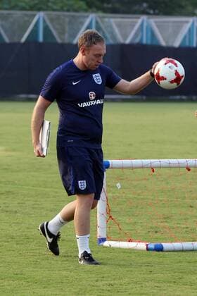 India: England football team practices England Coach Steve Cooper walks with football during practices ahead of the FIFA U 17 World Cup India 2017 Final match in Kolkata. Players of the England football team during a practice session ahead of FIFA U 17 World Cup India 2017 Final match against Spain on October 27, 2017 in Kolkata. Kolkata West Bengal India Kolkata  SaikatxPaulx xPacificxPress