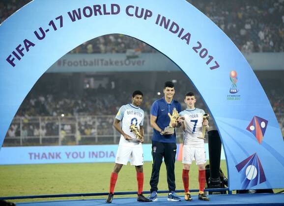India: England players celebrate their win England Rhain Brewster, Brazil Gabriel Brazo and England Philip Foden (from left to right) posed with their trophies during the prize distribution ceremony in Kolkata. England wins FIFA U 17 World Cup India 2017 on October 28, 2017 in Kolkata. Kolkata West Bengal India Kolkata  SaikatxPaulx xPacificxPress