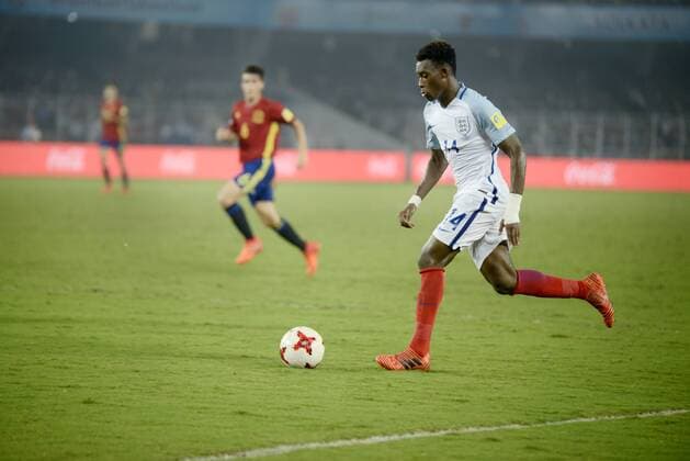 India: England wins FIFA U17 U 17 World Cup England Callum Hadson-Odoi (jersey 14) in actions the FIFA U 17 World Cup India 2017 Final match in Kolkata. Player of England and Spain in action during the FIFA U 17 World Cup India 2017 Final match on October 28, 2017 in Kolkata. England wins FIFA U 17 World Cup 5 - 2 goals against Spain. Kolkata West Bengal India Kolkata  SaikatxPaulx xPacificxPress