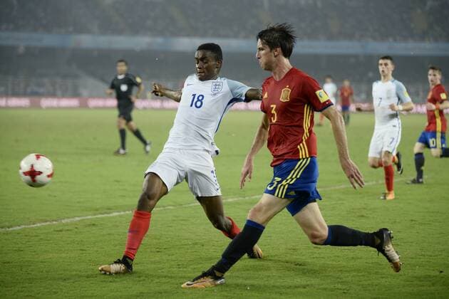 India: England wins FIFA U17 U 17 World Cup Spain Juan Miranda (jersey 3) and England Steven Sessegnon (jersey 10) in actions the FIFA U 17 World Cup India 2017 Final match in Kolkata. Player of England and Spain in action during the FIFA U 17 World Cup India 2017 Final match on October 28, 2017 in Kolkata. England wins FIFA U 17 World Cup 5 - 2 goals against Spain. Kolkata West Bengal India Kolkata  SaikatxPaulx xPacificxPress