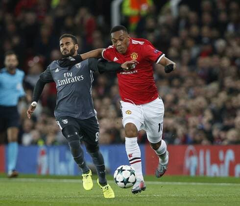 Anthony Martial of Manchester United ManU drifts past Douglas of SL Benfica during the Champions League Group A match at the Old Trafford Stadium, Manchester. Picture date: October 31st 2017. Picture credit should read: Andrew Yates Sportimage EDITORIAL USE ONLY. No use with unauthorised audio, video, data, fixture lists, club league logos or live services. Online in-match use limited to 120 images, no video emulation. No use in betting, games or single club league player publications.