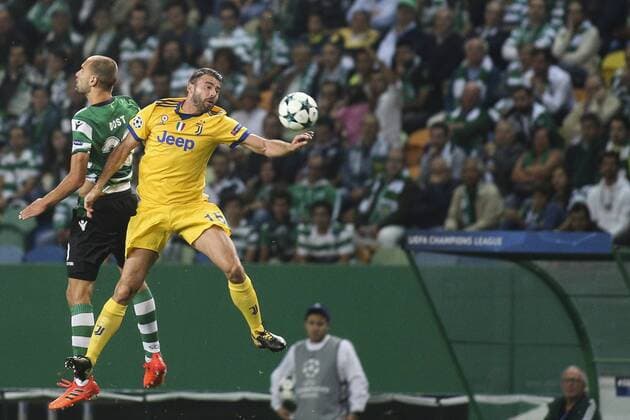 October 31, 2017 - Lisbon, Portugal - Juventus s defender Andrea Barzagli (R) vies wirth Sporting s forward Bas Dost during the Champions League football match between Sporting CP and Juventus FC at Jose Alvalade Stadium in Lisbon on October 31, 2017. Sporting CP v Juventus - UEFA Champions League  - ZUMAn230 20171031_zaa_n230_313 Copyright: xCarlosxCostax