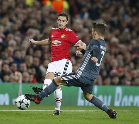 Matteo Darmian of Manchester United ManU tackled by Alex Grimaldo of SL Benfica during the Champions League Group A match at the Old Trafford Stadium, Manchester. Picture date: October 31st 2017. Picture credit should read: Andrew Yates Sportimage EDITORIAL USE ONLY. No use with unauthorised audio, video, data, fixture lists, club league logos or live services. Online in-match use limited to 120 images, no video emulation. No use in betting, games or single club league player publications.