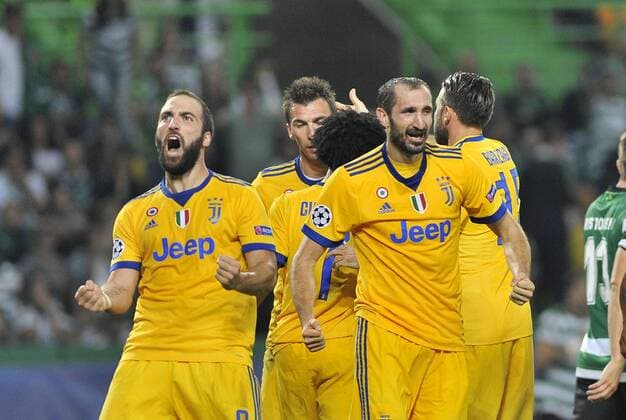 Sporting Lisbon v Juventus UEFA Champions League Gonzalo Higuain of Juventus celebrates scoring their first goal with team mates during the UEFA Champions League match at Est?dio Jos? Alvalade, Lisbon Content Not Available For UK Newspapers Copyright: xStefanoxGnechx FIL-10891-0024