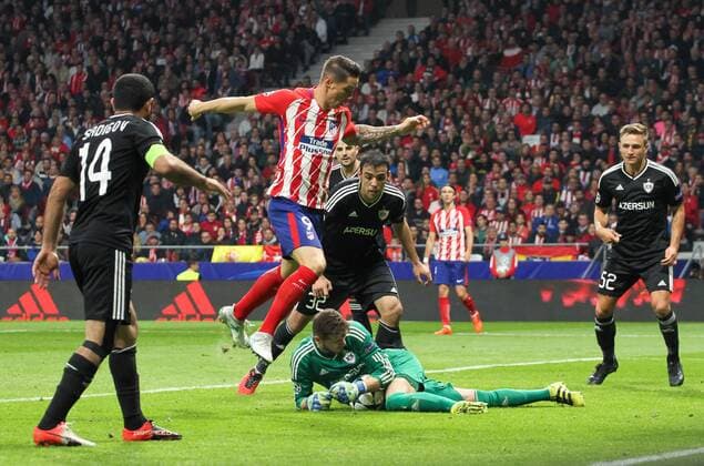 Atletico de MadridÂ s forward Torres and Qarabag s goalkeeper Sehic during Champions League match between Atletico Madrid and Qarabag at the Wanda Metropolitano stadium in Madrid Tuesday Oct 31th 2017  xIrinaxR.xH.x xAFP7x xAtxMadridxvxQarabag,xChampionsxLeague,xSpain,xOctx31thx2017x