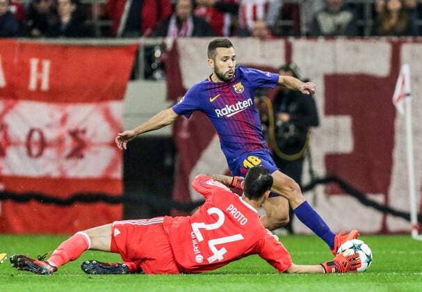 (171101) -- ATHENS, Nov. 1, 2017 -- Goalkeeper of Olympiacos Silvio Proto (front), vies with Jordi Alba of Barcelona during their UEFA Champions League group D match in Athens, Greece, on Oct. 31, 2017. The match ended with a 0-0 tie. ) (SP)GREECE-ATHENS-FOOTBALL-UEFA CHAMPIONS LEAGUE-GROUP D LefterisxPartsalis 