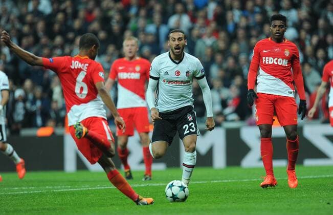 Cenk Tosun of Besiktas and Jorge and Jamerson of Monaco during the UEFA Champions league Group G match between Besiktas and Monaco at Vodafone Arena in Istanbul on November 01 , 2017. 