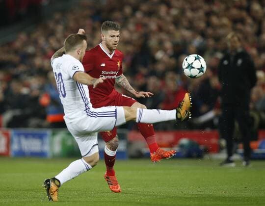 Alberto Moreno of Liverpool crosses the ball during the Champions League Group E match at Anfield Stadium, Liverpool. Picture date: November 1st 2017. Picture credit should read: Andrew Yates Sportimage EDITORIAL USE ONLY. No use with unauthorised audio, video, data, fixture lists, club league logos or live services. Online in-match use limited to 120 images, no video emulation. No use in betting, games or single club league player publications.