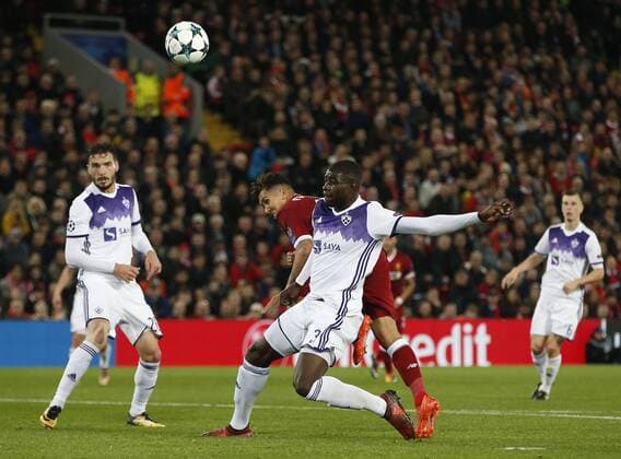 Roberto Firmino of Liverpool directs a header which was tipped over r the bar during the Champions League Group E match at Anfield Stadium, Liverpool. Picture date: November 1st 2017. Picture credit should read: Andrew Yates Sportimage EDITORIAL USE ONLY. No use with unauthorised audio, video, data, fixture lists, club league logos or live services. Online in-match use limited to 120 images, no video emulation. No use in betting, games or single club league player publications.