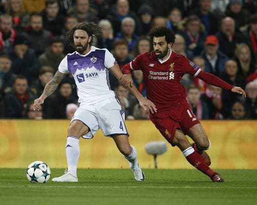 Marko Suler of NK Maribor tackled by Mohamed Salah of Liverpool during the Champions League Group E match at Anfield Stadium, Liverpool. Picture date: November 1st 2017. Picture credit should read: Andrew Yates Sportimage EDITORIAL USE ONLY. No use with unauthorised audio, video, data, fixture lists, club league logos or live services. Online in-match use limited to 120 images, no video emulation. No use in betting, games or single club league player publications.