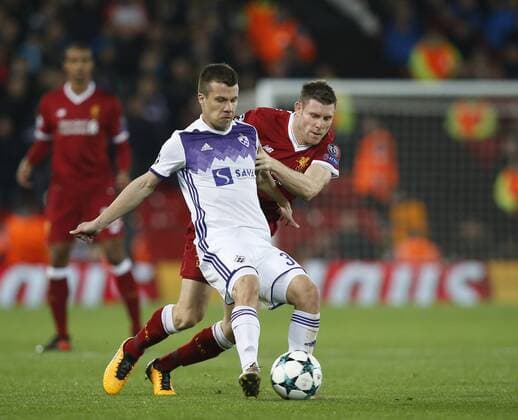James Milner of Liverpool chases after Jean-Claude Billong of NK Maribor during the Champions League Group E match at Anfield Stadium, Liverpool. Picture date: November 1st 2017. Picture credit should read: Andrew Yates Sportimage EDITORIAL USE ONLY. No use with unauthorised audio, video, data, fixture lists, club league logos or live services. Online in-match use limited to 120 images, no video emulation. No use in betting, games or single club league player publications.