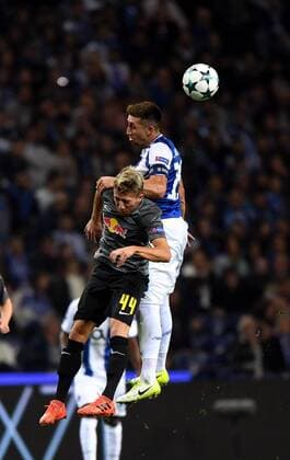 (171102) -- PORTO, Nov. 2, 2017 -- Hector Herrera of Porto (top) vies for the ball with Kevin Kampl of Leipzig during their Group G match of UEFA Champions League in Porto, Portugal on Nov. 1, 2017. Porto won 3-1.) (SP)PORTUGAL-PORTO-UEFA CHAMPIONS LEAGUE-GROUP G ZhangxLiyun 