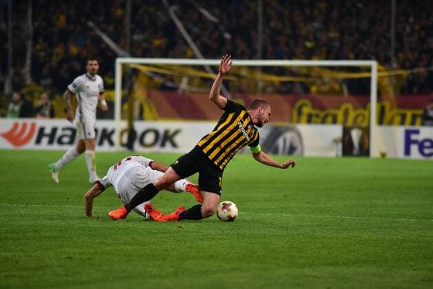 Italy: AEK versus Milan Jakob Johansson (no 18) and captain of AEK, wins a foul from Hakan Calhanoglu (no10) of Milan. Athens Attiki Greece OAKA Spiros Louis  DimitriosxKarvountzisx xPacificxPress
