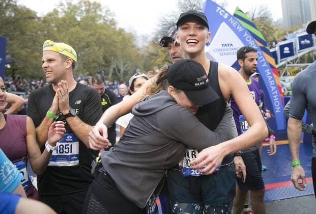 Super Model Karlie Kloss reacts when she crosses the finish line completing the NYRR TCS New York City Marathon in New York City on November 5, 2017. 50,000 runners from the Big Apple and around the world raced through the five boroughs on a course that winds its way from the Verrazano Bridge before crossing the finish line by Tavern on the Green in Central Park.  NYP20171105139 JOHNxANGELILLO