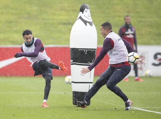 England Training Jesse Lingard (left) curls the ball past Jake Livermore of England during training at St Georges Park, Burton upon Trent Content Not Available For UK Newspapers Copyright: xJAMESxWILSONx FIL-10915-0033