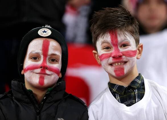 10th November 2017, Wembley Stadium, London, England; International football friendly, England versus Germany; England fans with Saint Georges Cross face paint posing from inside Wembley Stadium before kick off  ActionPlus11949178