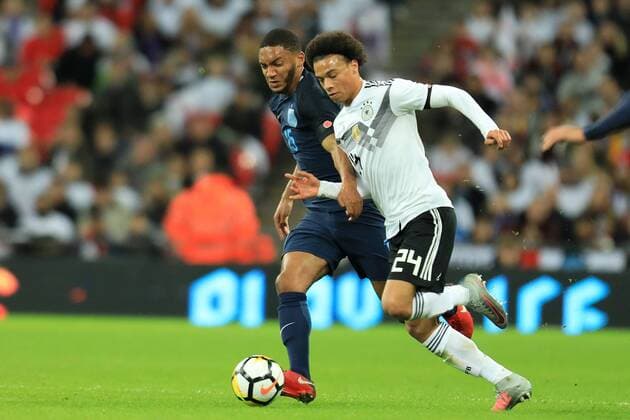 10th November 2017, Wembley Stadium, London, England; International football friendly, England versus Germany; Joe Gomez of England makes a challenge on Leroy Sane of Germany  ActionPlus11949248