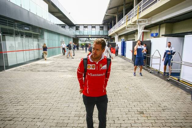 Dia de treino classificatório para GP F1 SÃO PAULO, SP - 11.11.2017: DIA DE TREINO CLASSIFICATÓRIO PARA GP F1 - In the photo the pilot, Sebastian Vettel of Scuderia FERRARI, arrives at the Autodromo of Interlagos. Classifying training day on Saturday (11), for the Brazilian Formula 1 Grand Prix, which will take place on Sunday (12) at the José Carlos Pace racetrack in Interlagos. (Photo: Aloisio Mauricio Fotoarena) x1424889x  AloisioxMauricio