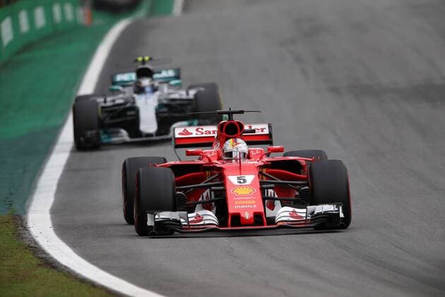 11.11.2017 - Free Practice 3, Sebastian Vettel (GER) Scuderia Ferrari SF70H and Valtteri Bottas (FIN) Mercedes AMG F1 W08 Brazilian Grand Prix, Sao Paulo, Interlagos 9 - 12 November 2017 11.11.2017 - Free Practice 3, Sebastian Vettel (GER) Scuderia Ferrari SF70H and Valtteri Bottas (FIN) Mercedes AMG F1 W08 