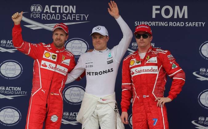 11.11.2017 - Qualifying, 2nd place Sebastian Vettel (GER) Scuderia Ferrari SF70H, Valtteri Bottas (FIN) Mercedes AMG F1 W08 pole position and 3rd place Kimi Raikkonen (FIN) Scuderia Ferrari SF70H Brazilian Grand Prix, Sao Paulo, Interlagos 9 - 12 November 2017 11.11.2017 - Qualifying, 2nd place Sebastian Vettel (GER) Scuderia Ferrari SF70H, Valtteri Bottas (FIN) Mercedes AMG F1 W08 pole position and 3rd place Kimi Raikkonen (FIN) Scuderia Ferrari SF70H 