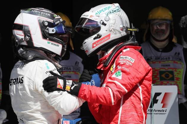 Formel 1, Sebastian Vettel gewinnt GP Brasilien 12.11.2017 - Race, 2nd place Valtteri Bottas (FIN) Mercedes AMG F1 W08 and Sebastian Vettel (GER) Scuderia Ferrari SF70H race winner Brazilian Grand Prix, Sao Paulo, Interlagos 9 - 12 November 2017 12.11.2017 - Race, 2nd place Valtteri Bottas (FIN) Mercedes AMG F1 W08 and Sebastian Vettel (GER) Scuderia Ferrari SF70H race winner 