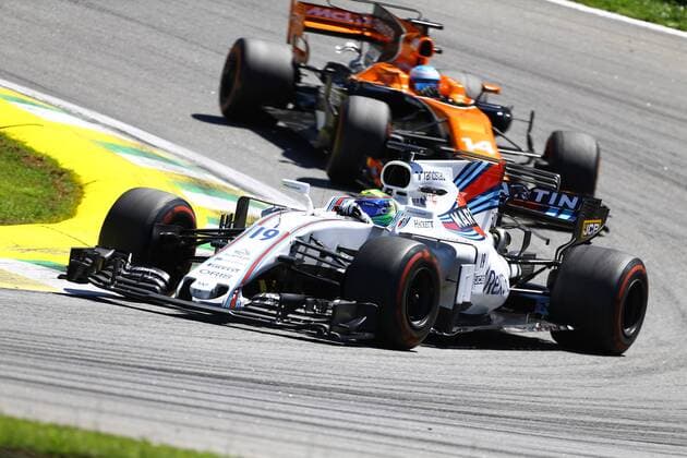 12.11.2017 - Race, Felipe Massa (BRA) Williams FW40 and Fernando Alonso (ESP) McLaren MCL32 Brazilian Grand Prix, Sao Paulo, Interlagos 9 - 12 November 2017 12.11.2017 - Race, Felipe Massa (BRA) Williams FW40 and Fernando Alonso (ESP) McLaren MCL32 