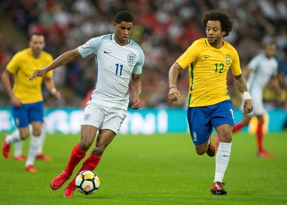 Marcus Rashford of England and Marcelo of Brazil during the International Friendly Länderspiel match between England and Brazil at Wembley Stadium, London, England on 14 November 2017. Copyright: xVincexMignottx 17710002