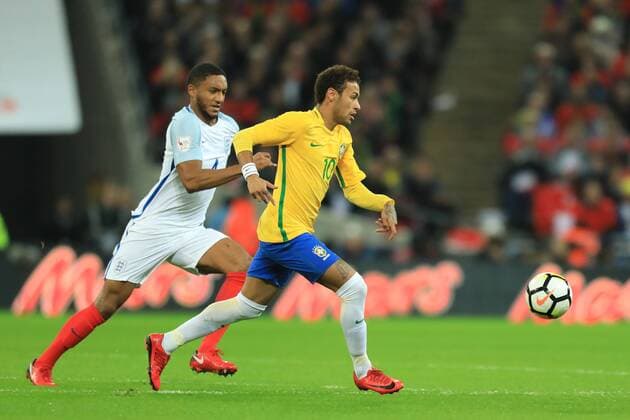 14th November 2017, Wembley Stadium, London, England; International football friendly, England versus Brazil; Neymar of Brazil is under pressure from Joe Gomez of England  ActionPlus11951251