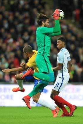 14th November 2017, Wembley Stadium, London, England; International football friendly, England versus Brazil; Alisson of Brazil collects the ball over Marcus Rashford of England  ActionPlus11951252