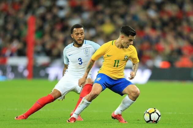 14th November 2017, Wembley Stadium, London, England; International football friendly, England versus Brazil; Philippe Coutinho of Brazil is under pressure from Ryan Bertrand of England  ActionPlus11951287
