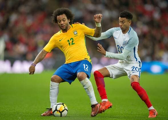 Marcelo of Brazil and Jesse Lingard of England battle for possession during the International Friendly Länderspiel match between England and Brazil at Wembley Stadium, London, England on 14 November 2017. Copyright: xVincexMignottx 17710012