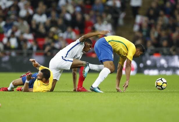 (171115) -- LONDON, Nov. 15, 2017 -- Casemiro (R) of Brazil vies with Marcus Rashford (C) of England during a friendly match at Wembley Stadium in London, Britain on Nov. 14, 2017. The match ended with a 0-0 draw. ) (SP)BRITAIN-LONDON-SOCCER-FRIENDLY MATCH-ENG VS BRA HanxYan 