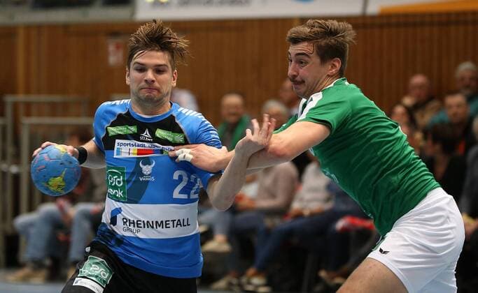 v.li.: Felix Handschke (HC Rhein Vikings), Lukas Böhm (DJK Rimpar Wölfe), DKB 2. Handball-Bundesliga, DJK Rimpar Wölfe - HC Rhein Vikings,