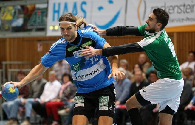 v.li.: Thomas Heider (HC Rhein Vikings), Benjamin Herth (DJK Rimpar Wölfe), DKB 2. Handball-Bundesliga, DJK Rimpar Wölfe - HC Rhein Vikings,